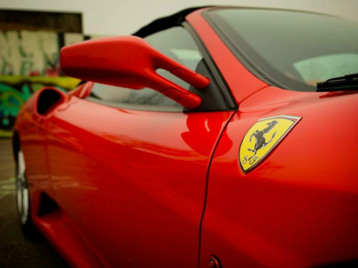 Ferrari is known for exotic sports cars Ferrari is known for exotic sports cars